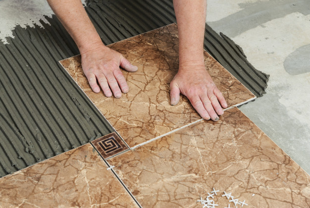 laying-the-tiles_191163-566.jpg (105 KB)
